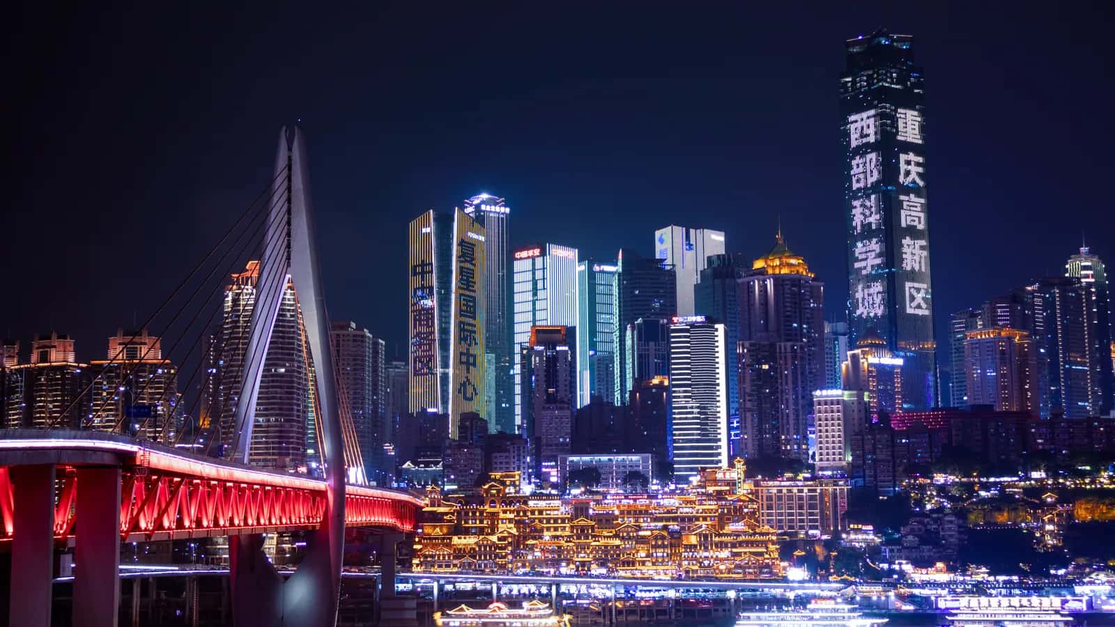 Chongqing skyline at night across the river.
