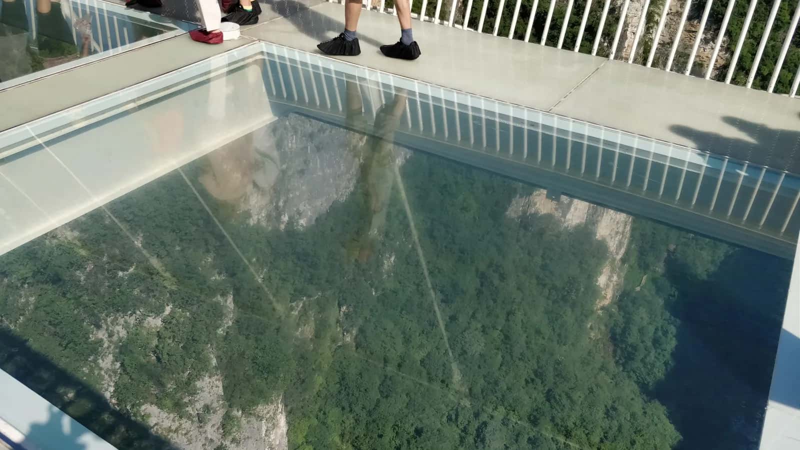 Zhangjiajie Grand Canyon Glass Bridge as an optional day-two swap.