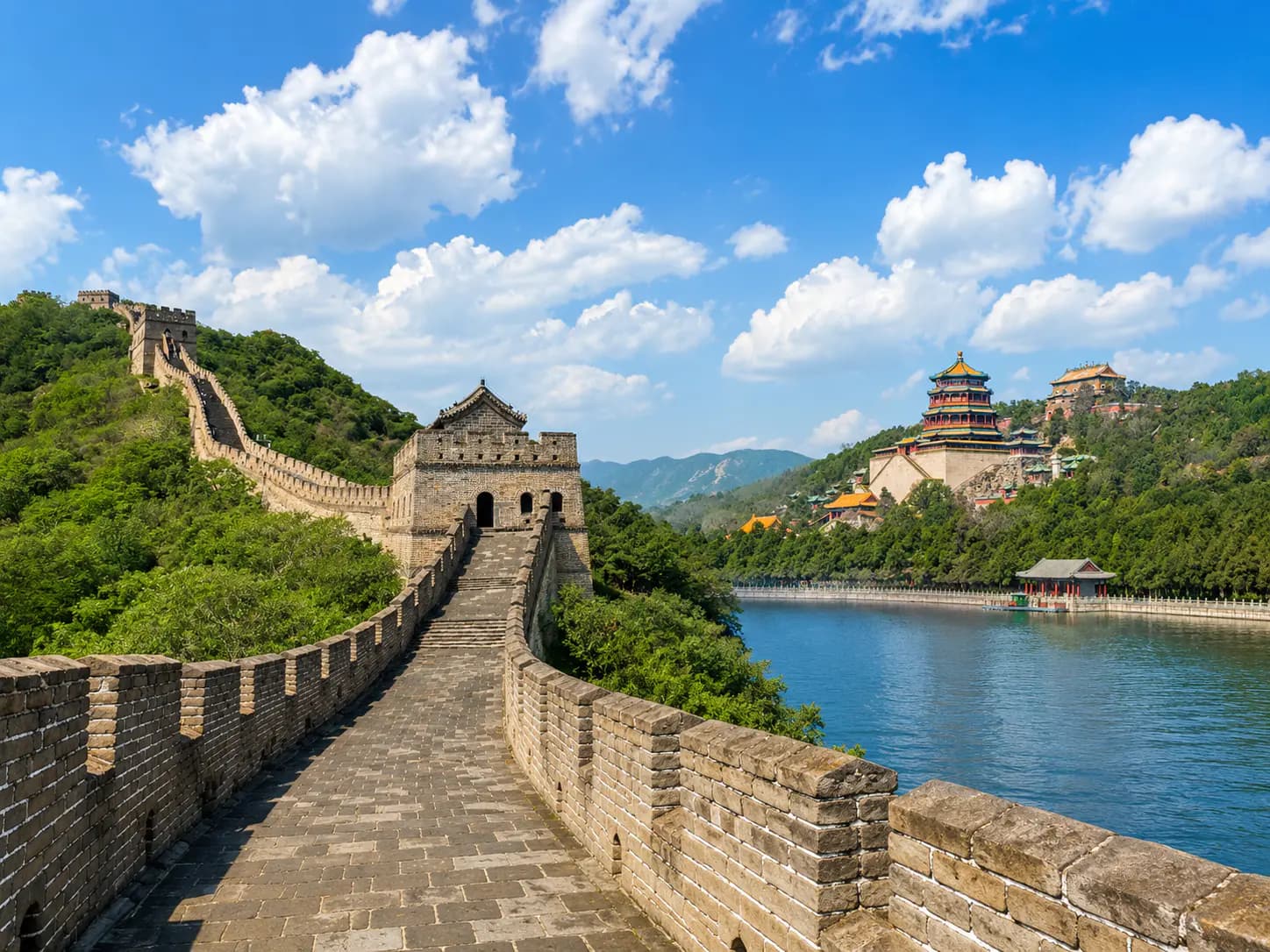 Mutianyu Great Wall combined with the Summer Palace in Beijing under blue sky and clouds