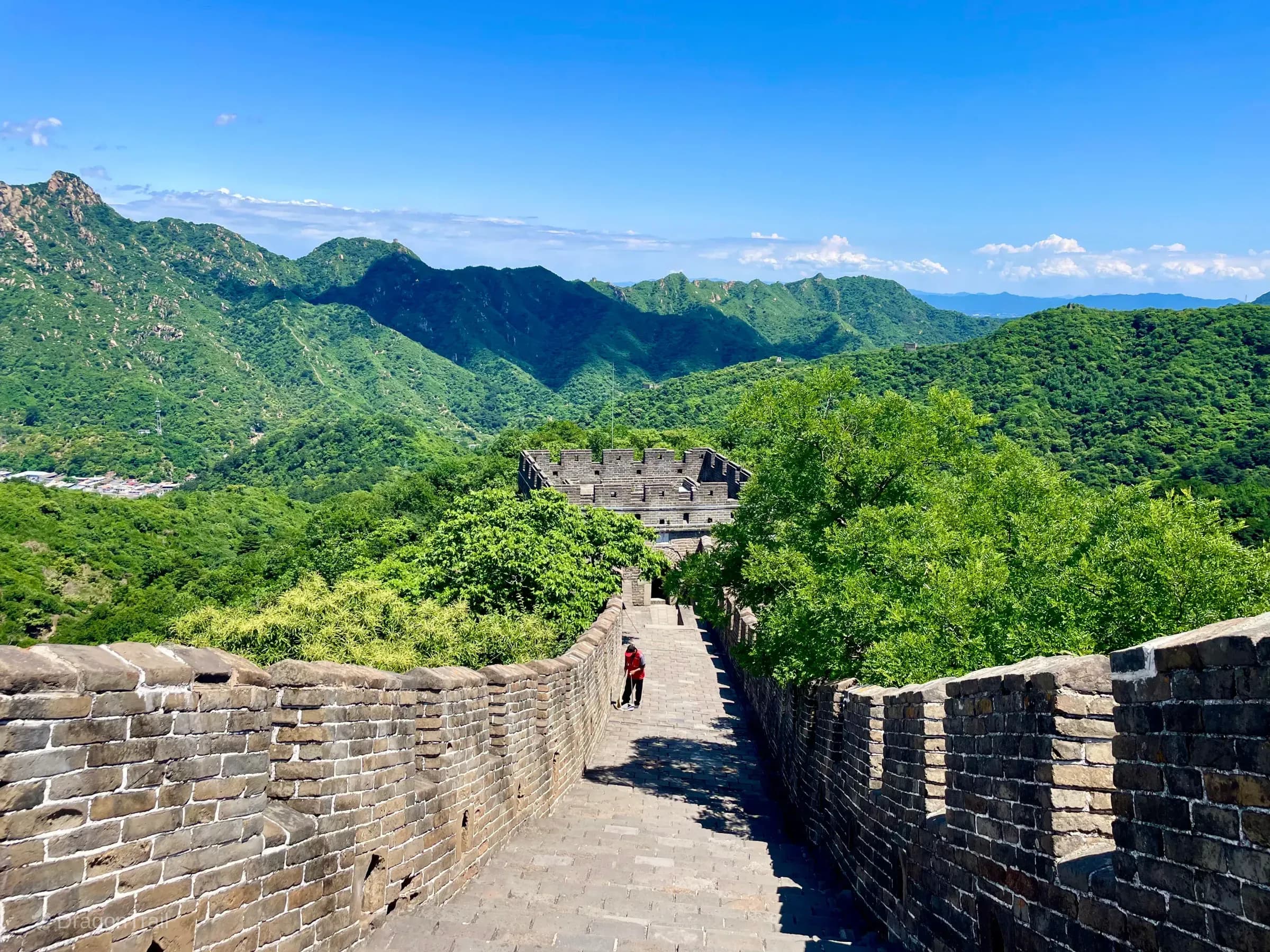 High-angle Mutianyu walkway descending toward Tower 11