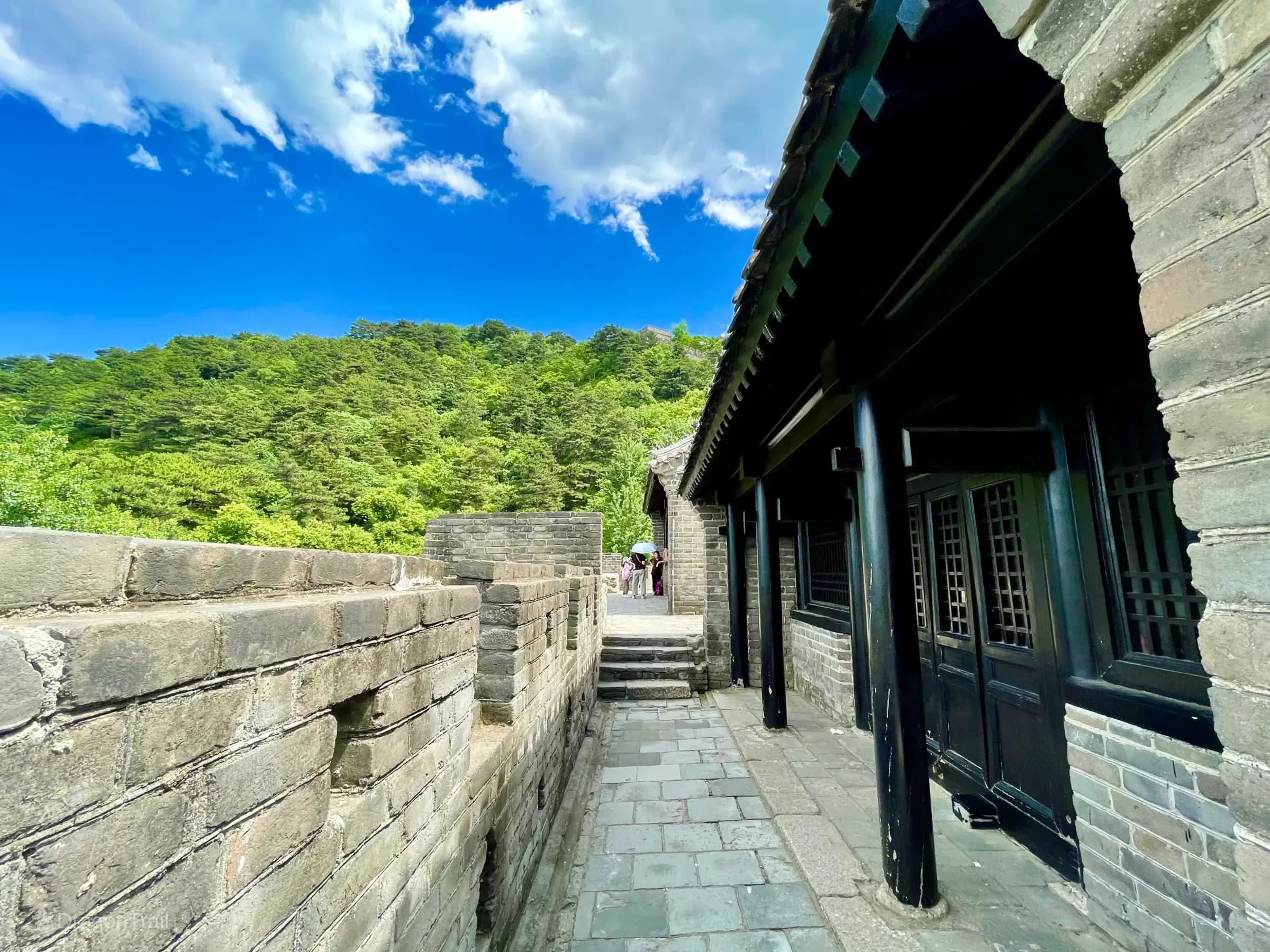 Mutianyu Tower 4 covered walkway with wooden lattice doors
