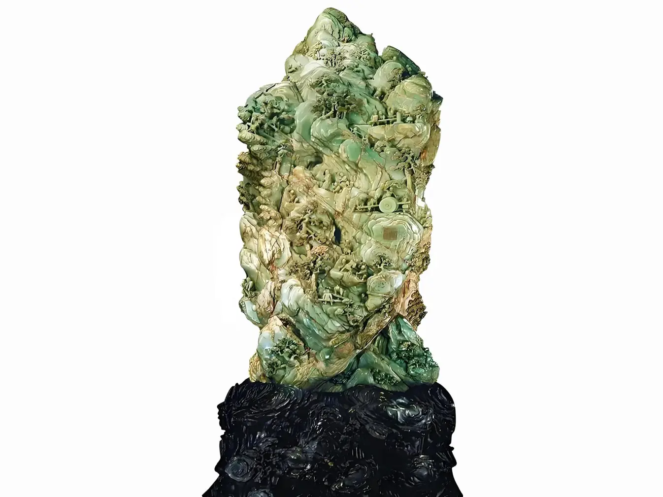 A detailed nephrite boulder carving depicting scenes of Da Yu taming floods, with intricate figures and landscapes.