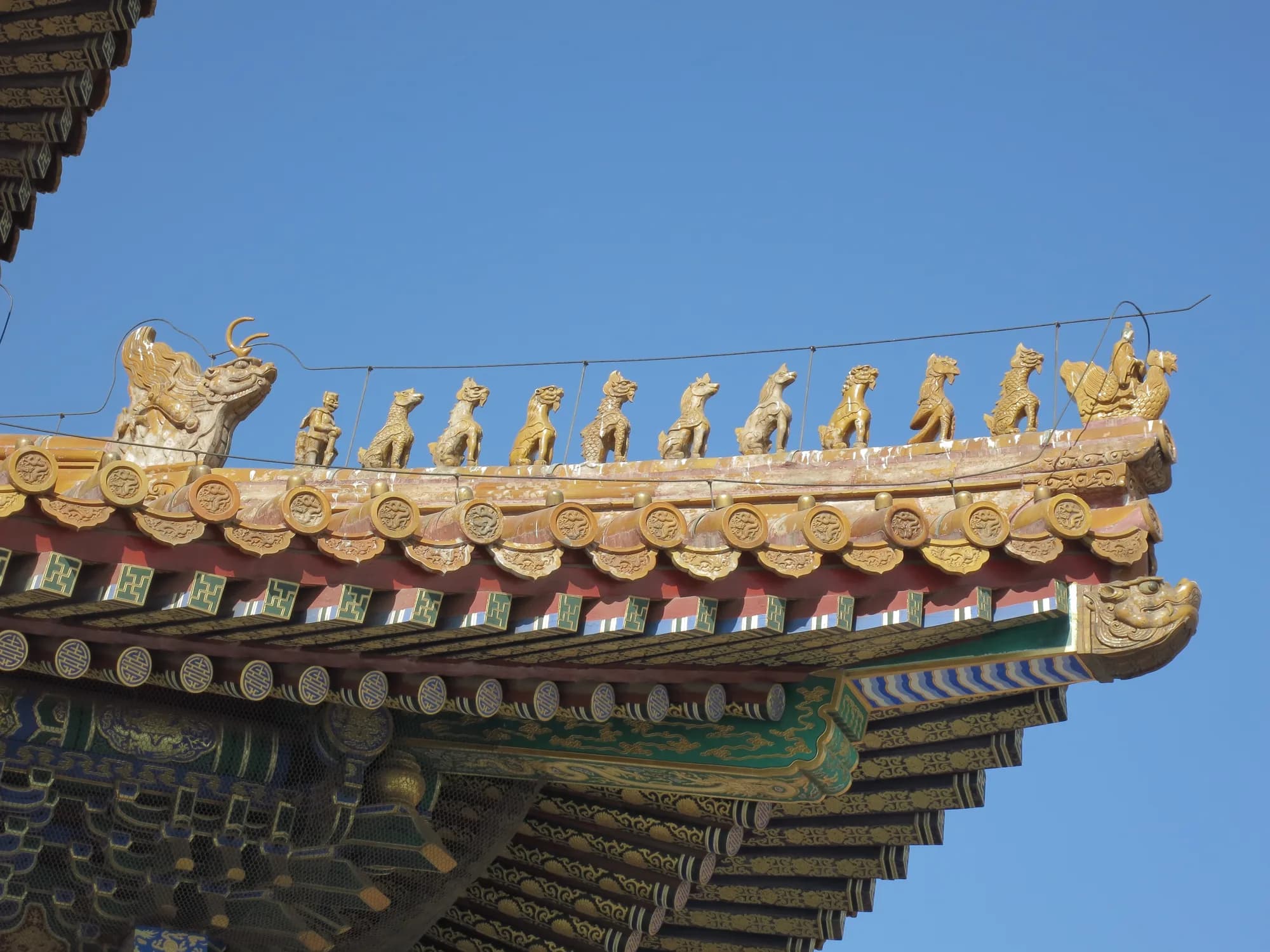 Ridge beasts and roof ornament on the Hall of Supreme Harmony at the Forbidden City