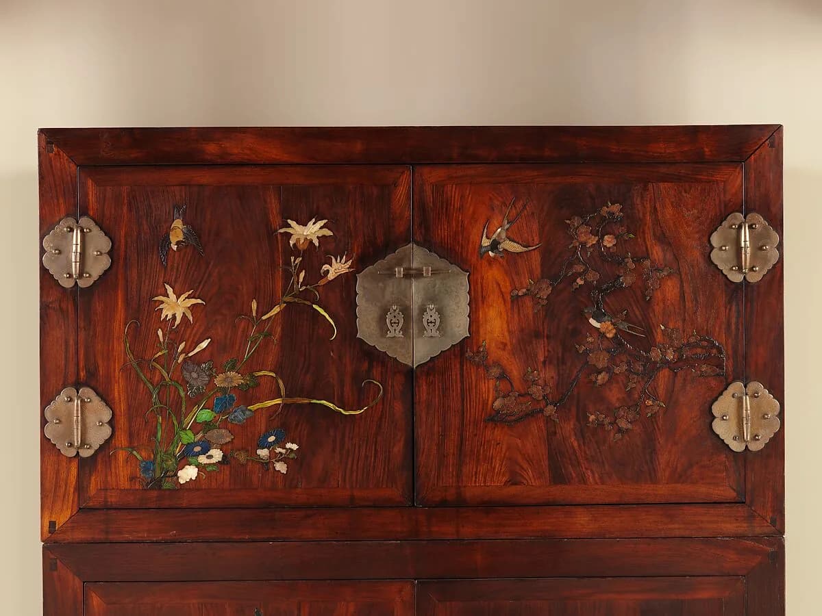 Detail of Ming Chinese wardrobe doors, metal fittings, wood grain and inlay