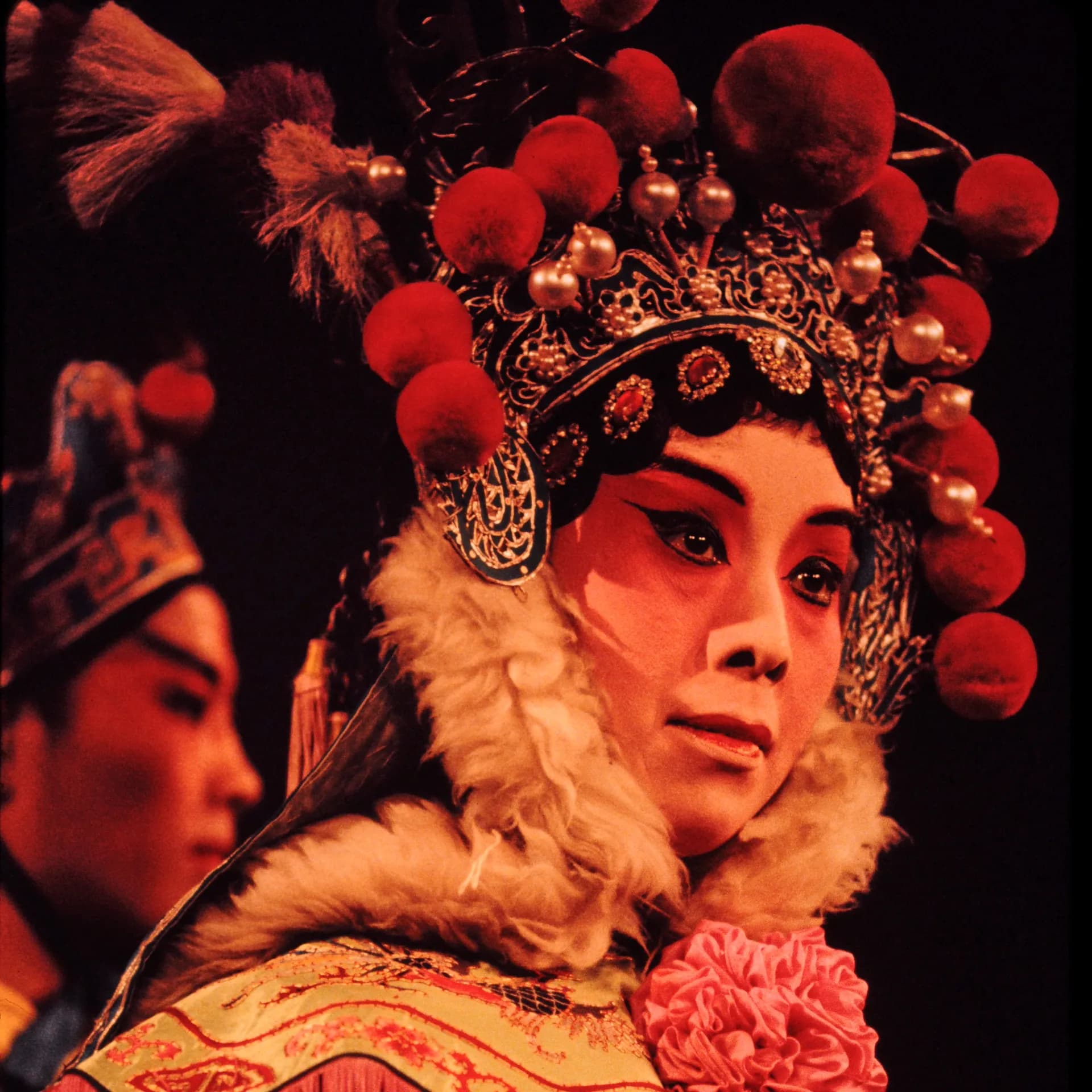 Peking Opera Jing role with traditional painted facial makeup.