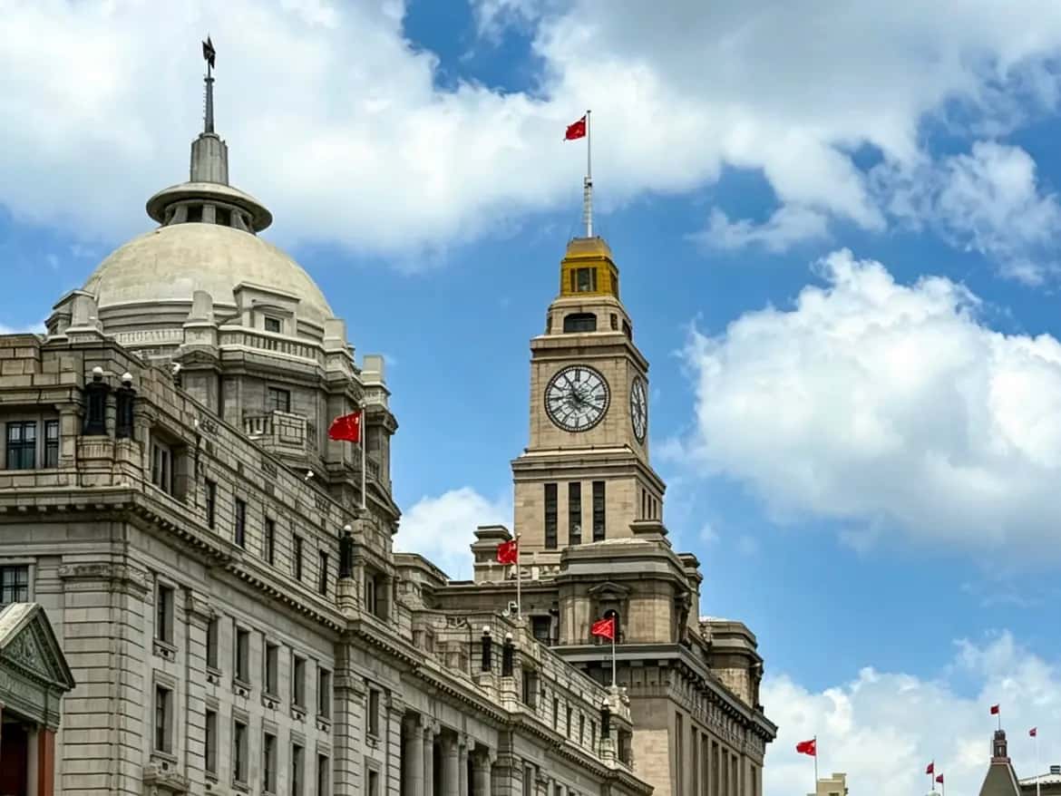 Bund clock tower and riverside skyline on a short Shanghai layover tour.