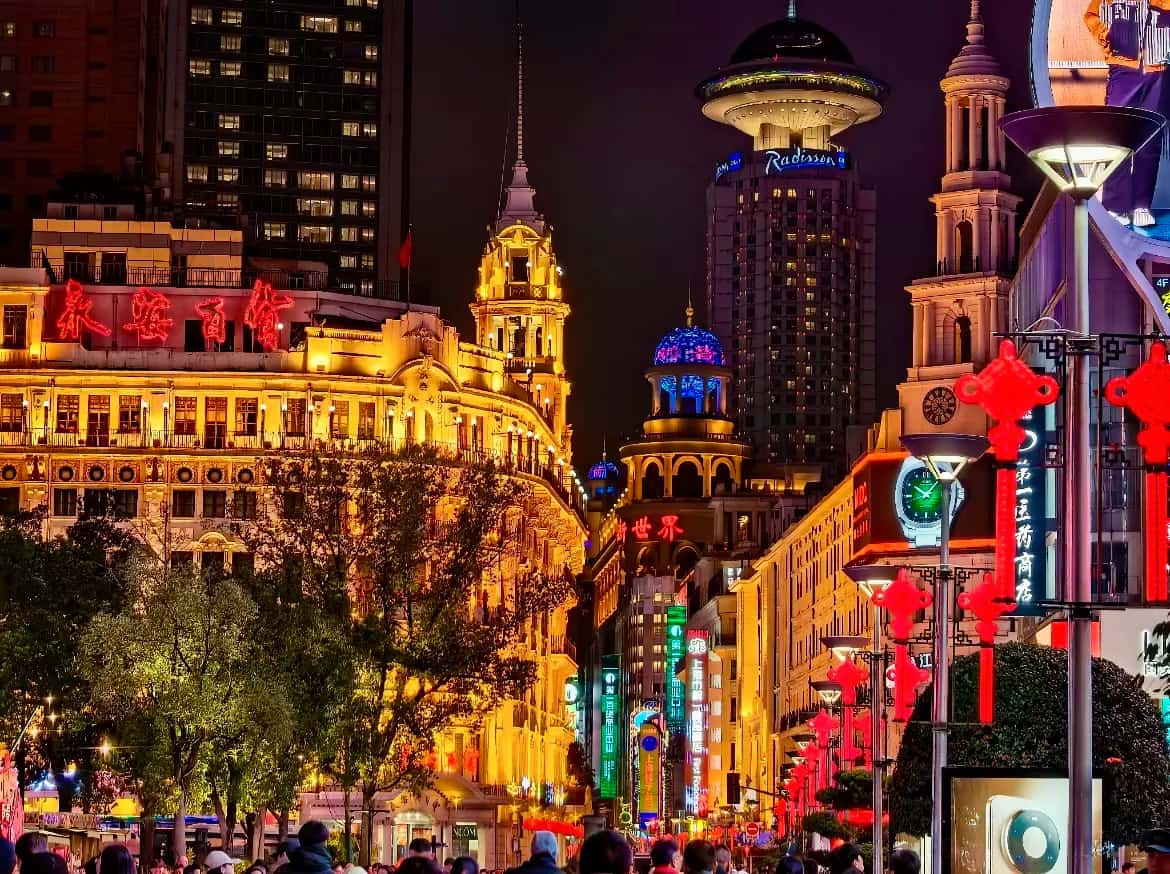 Nanjing Road and evening city lights on a full Shanghai layover tour.