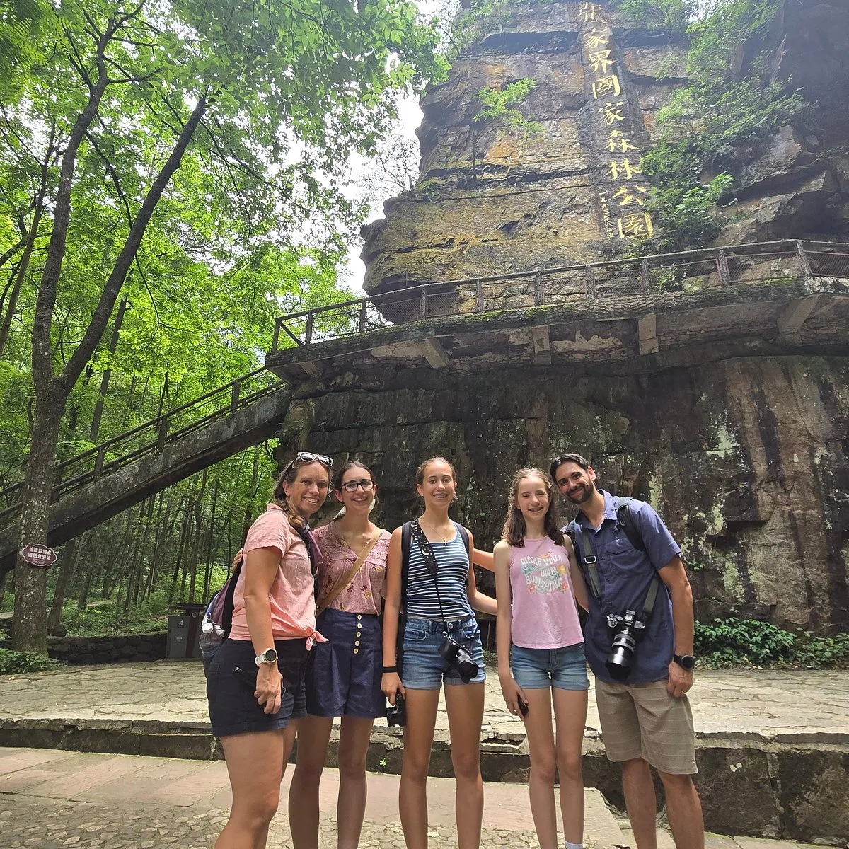 Family photo from a Zhangjiajie National Park and Tianmen tour.