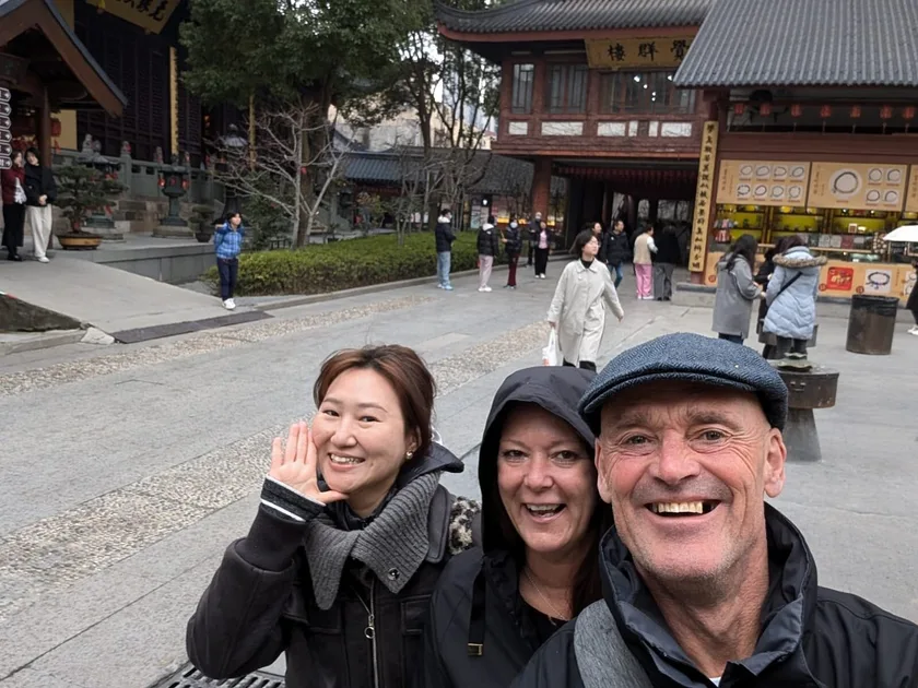 Travelers exploring Shanghai highlights on a private layover day tour.