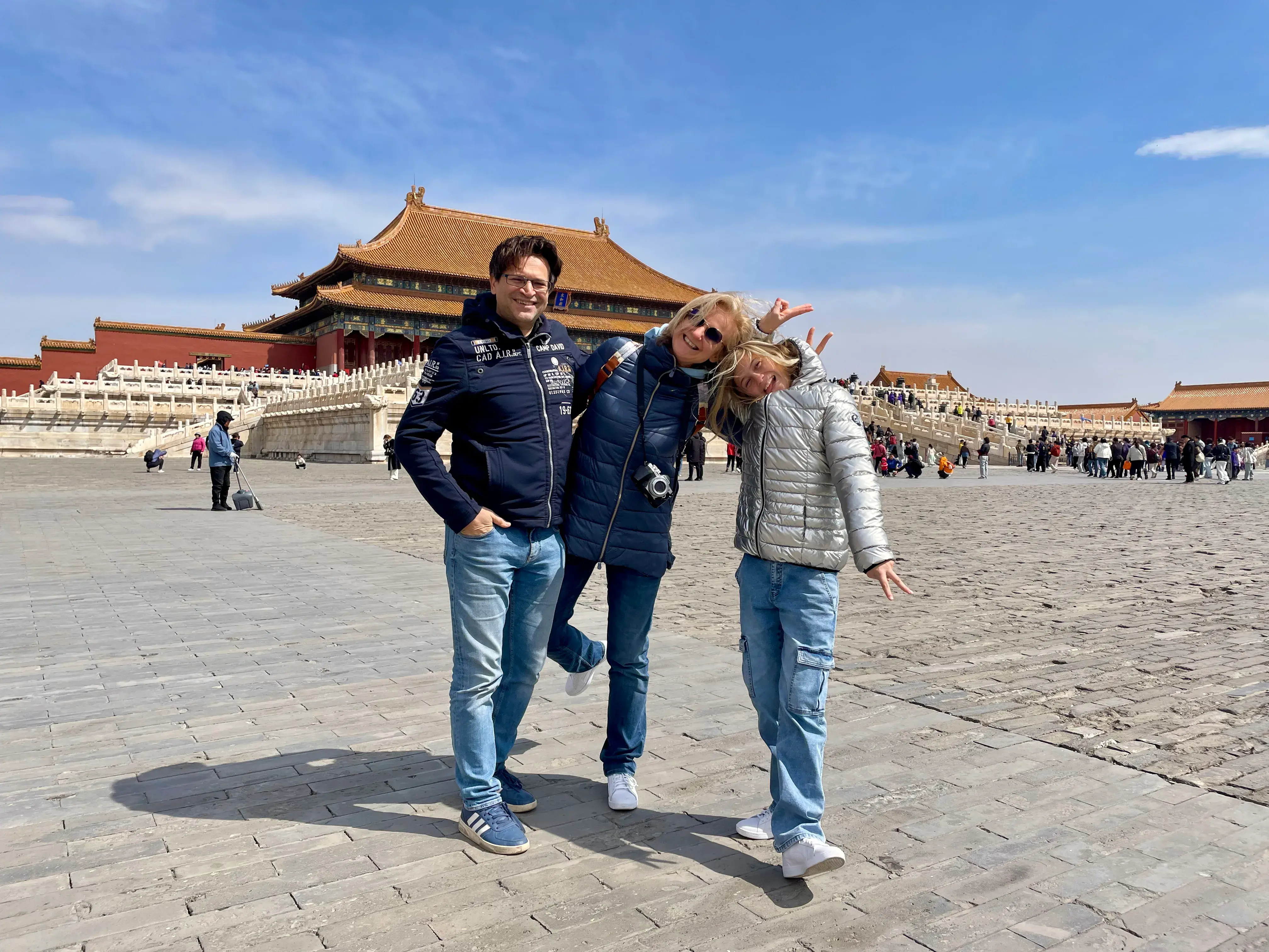 Family posing at the Forbidden City during a private Beijing tour.