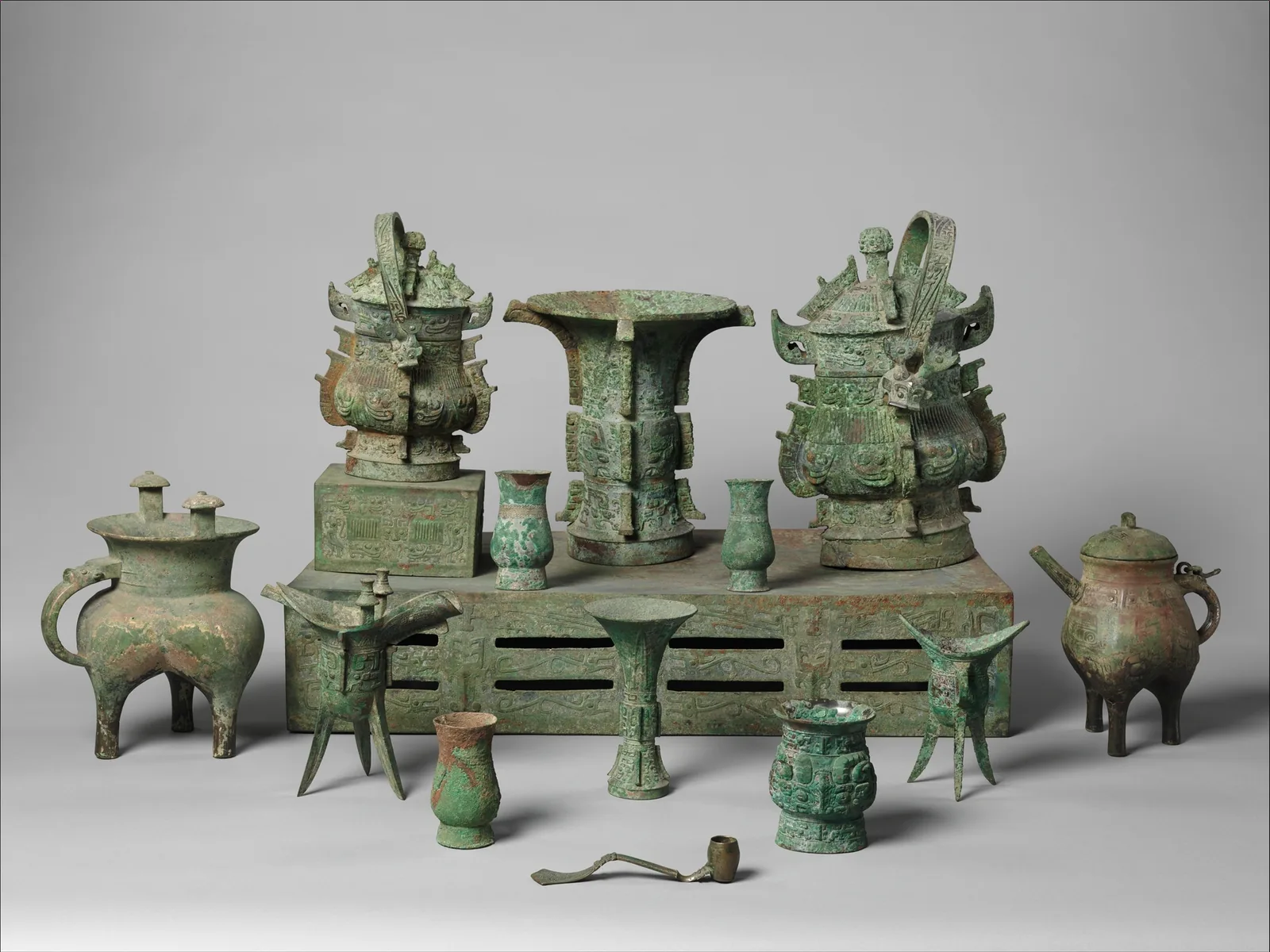 Ancient Chinese bronze ritual altar set with multiple vessels