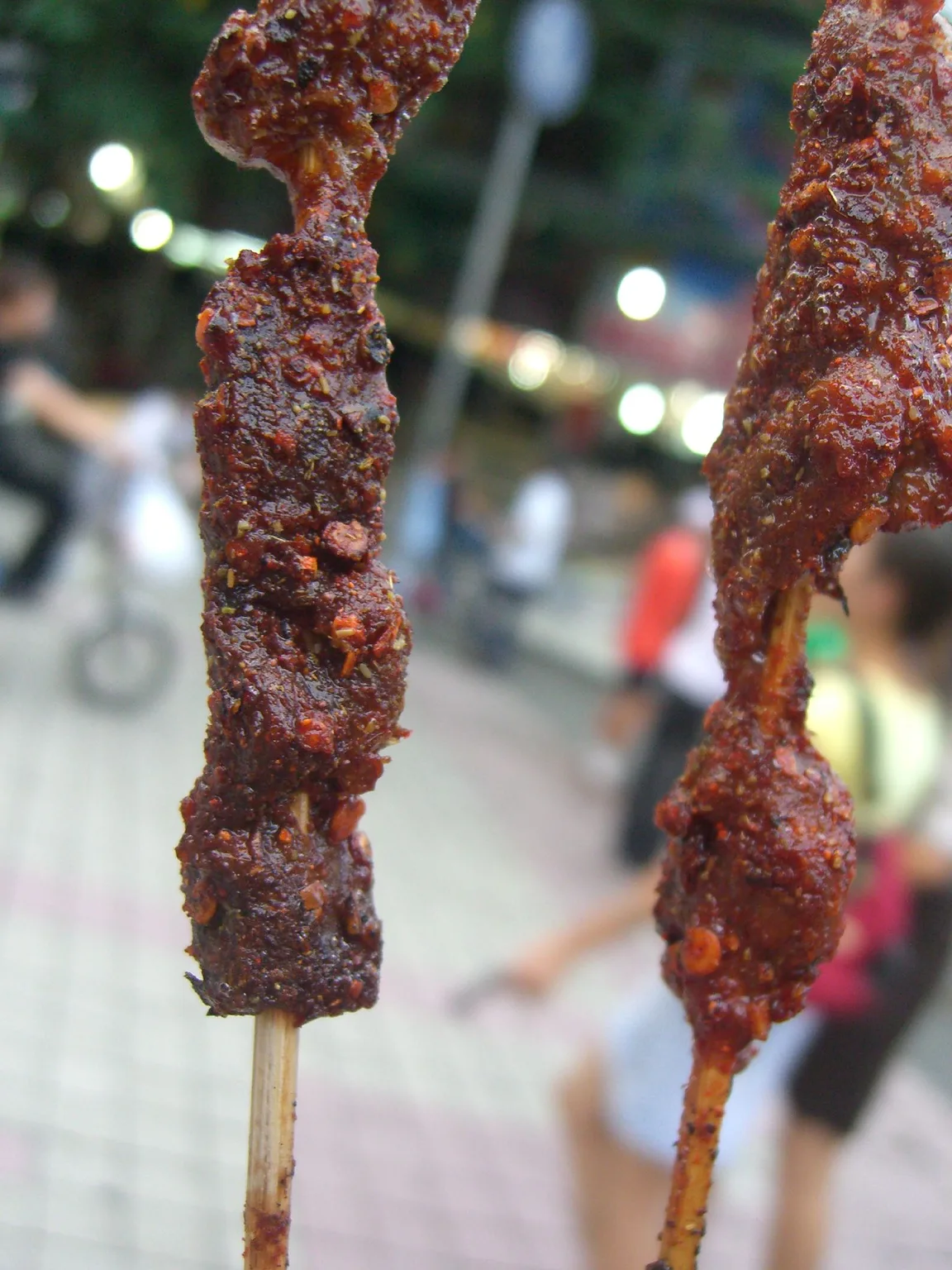 Lamb skewers seasoned with cumin and chilli, common at northwest grill stalls