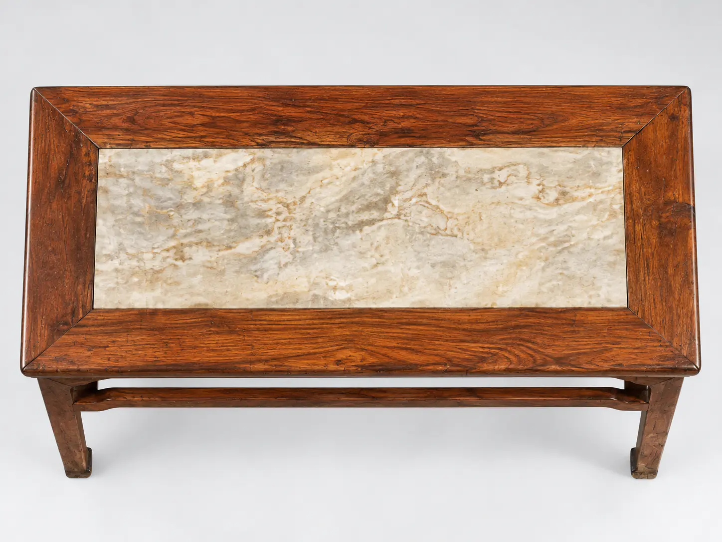 Top view of a Ming huanghuali side table showing framed tabletop construction