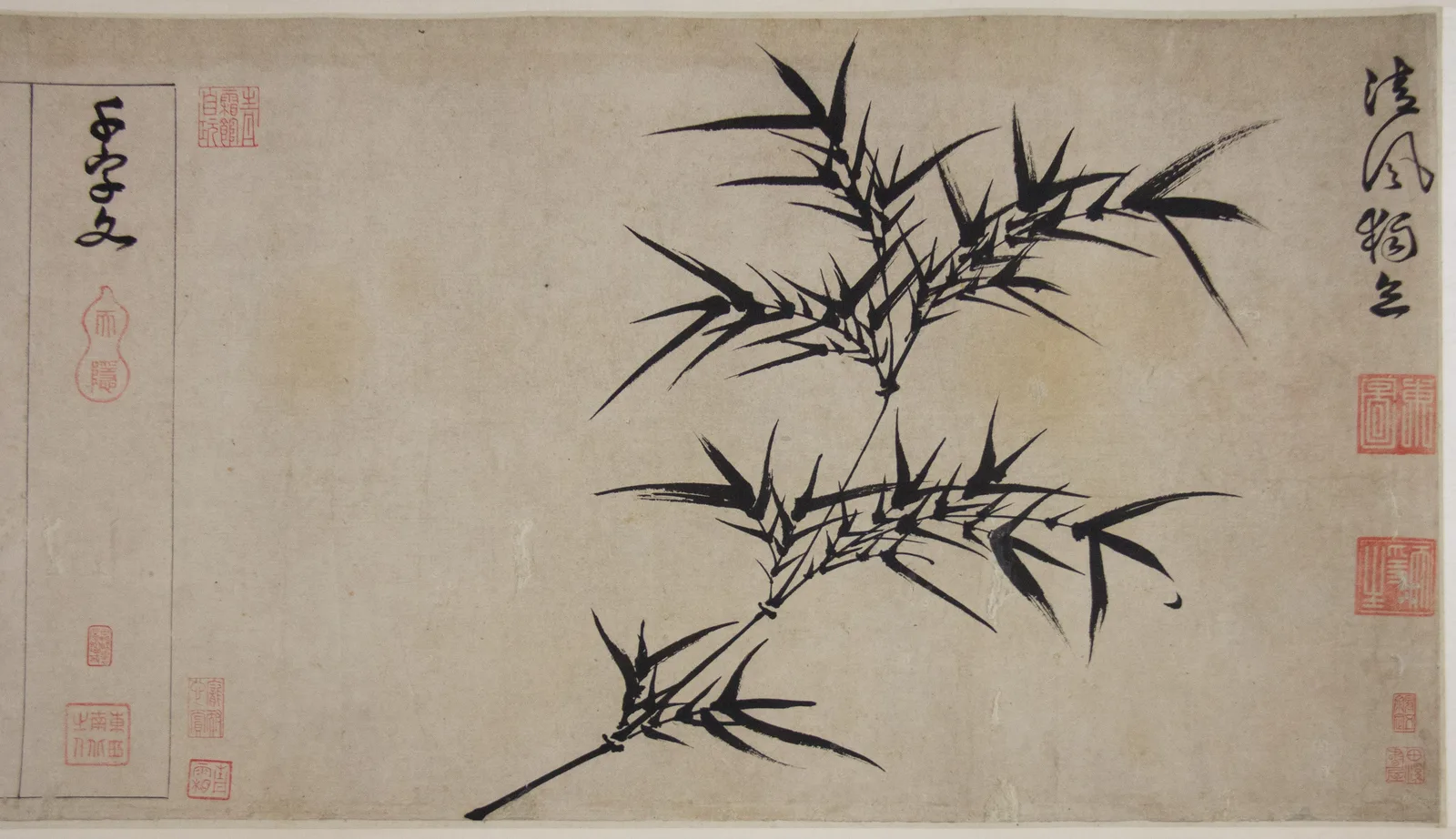 Ming dynasty Chinese bamboo painting beside calligraphy on a handscroll