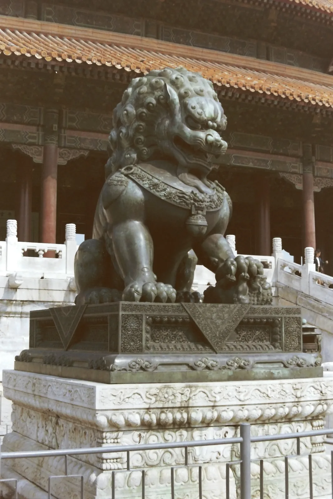 Gilded bronze guardian lion sculpture at the Forbidden City in Beijing