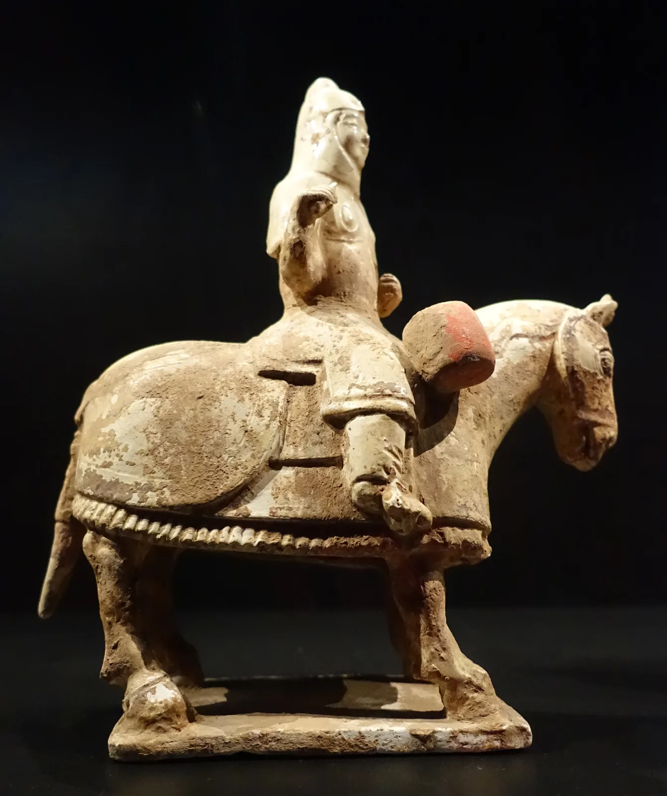Tang dynasty pottery horse and rider figure