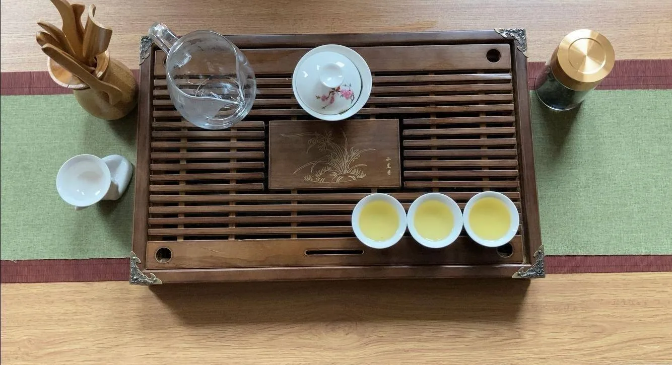 Gaiwan, pitcher and cups arranged for Chinese tea service