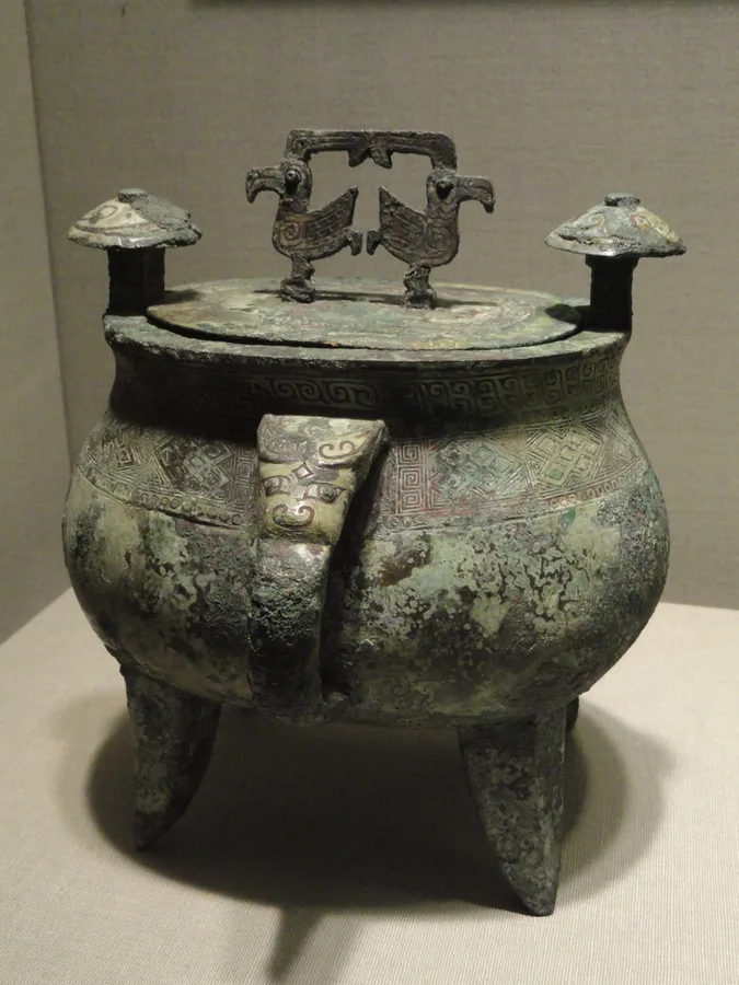 Bronze Chinese wine vessel (jia), late Shang period example in museum collection