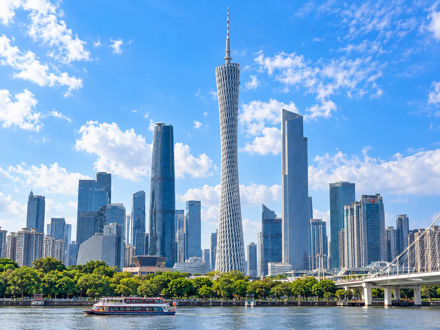 Guangzhou skyline with Canton Tower beside the Pearl River during the day
